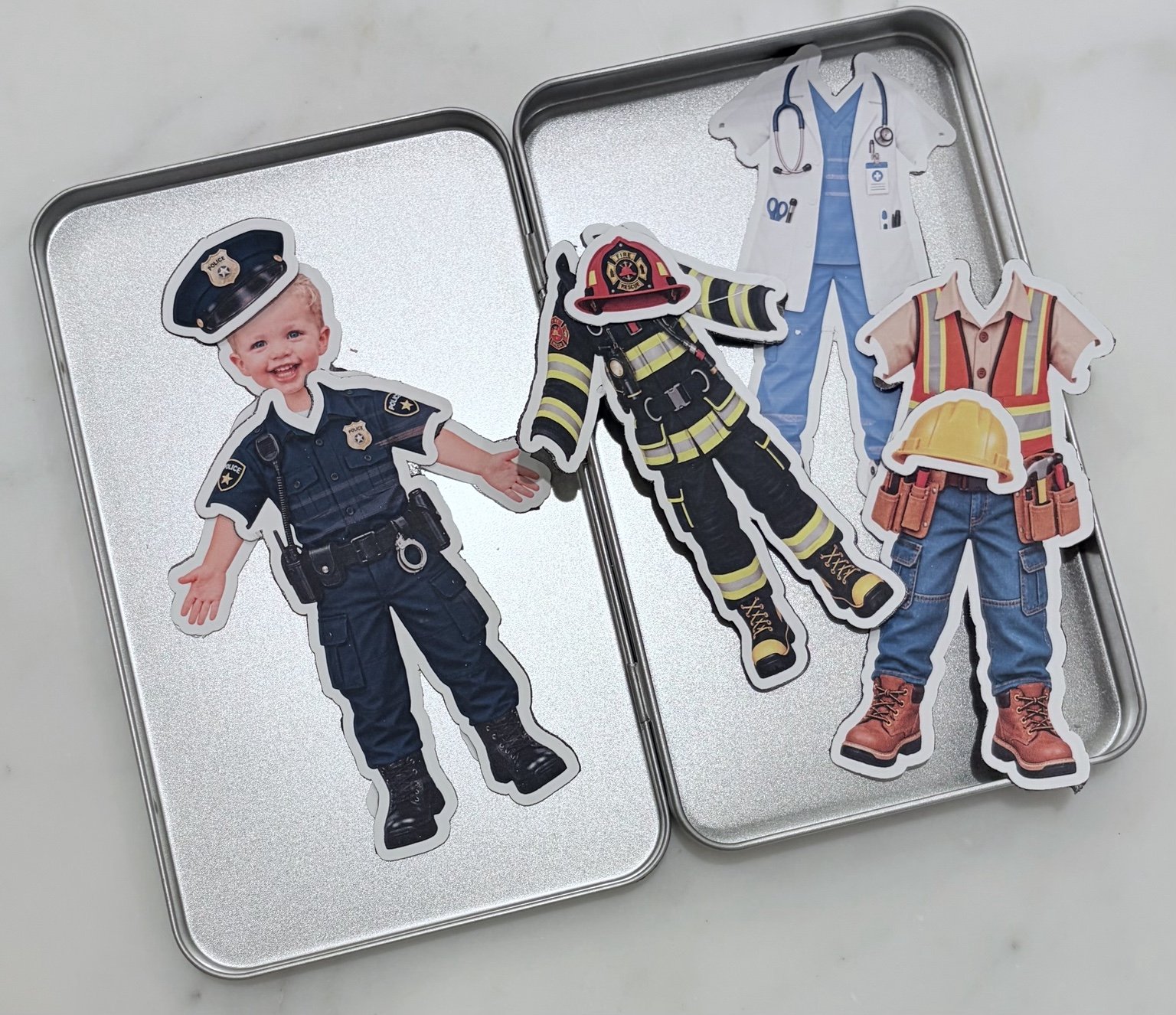 Boy doll dressed as police officer with community helper outfit set
