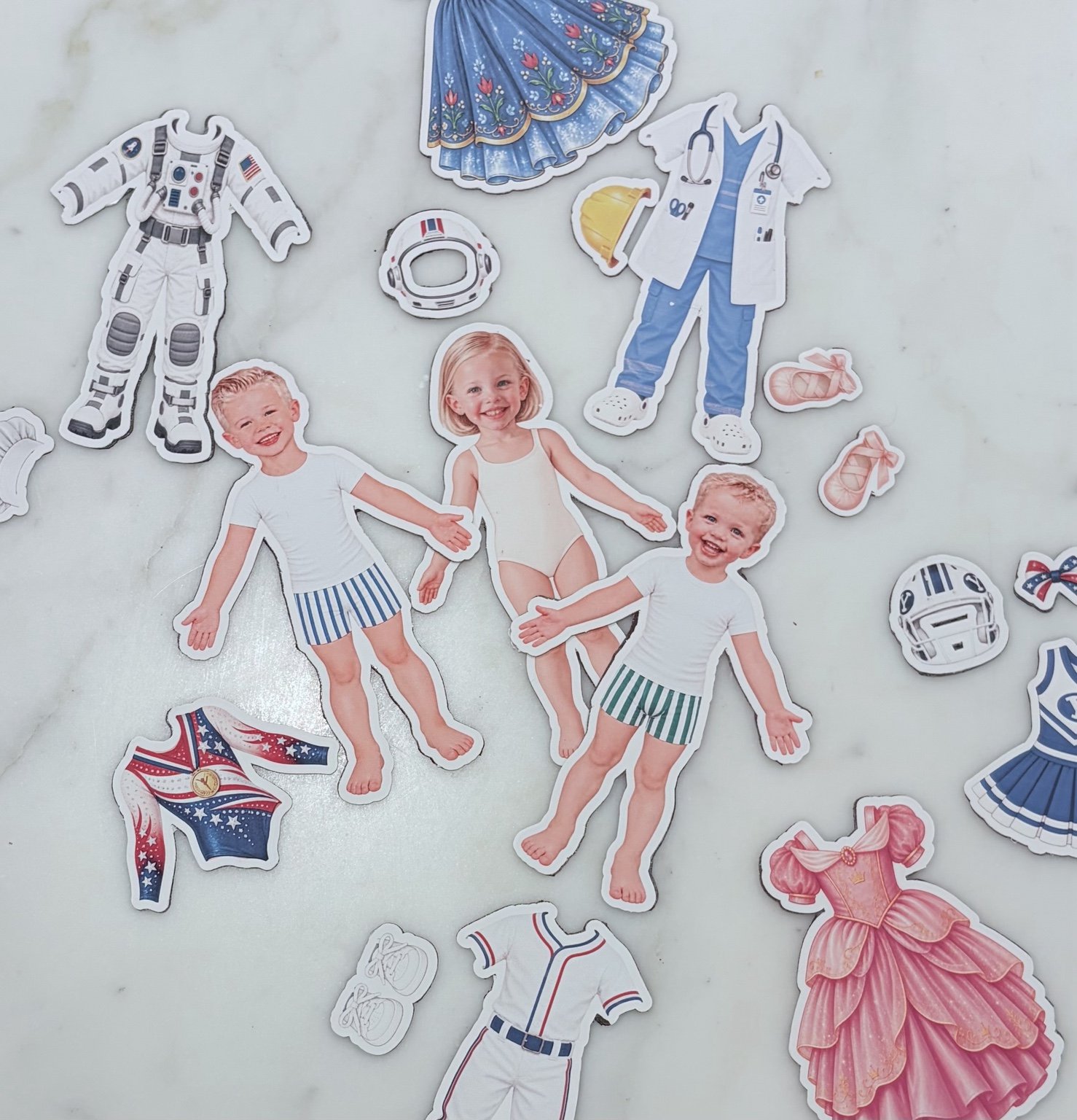 Custom dolls with assorted magnetic dress-up outfits
